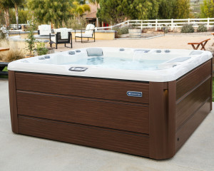 Outdoor hot tub installation to help reduce your stress.