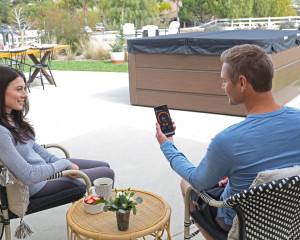 Man and woman using SmartTub System.